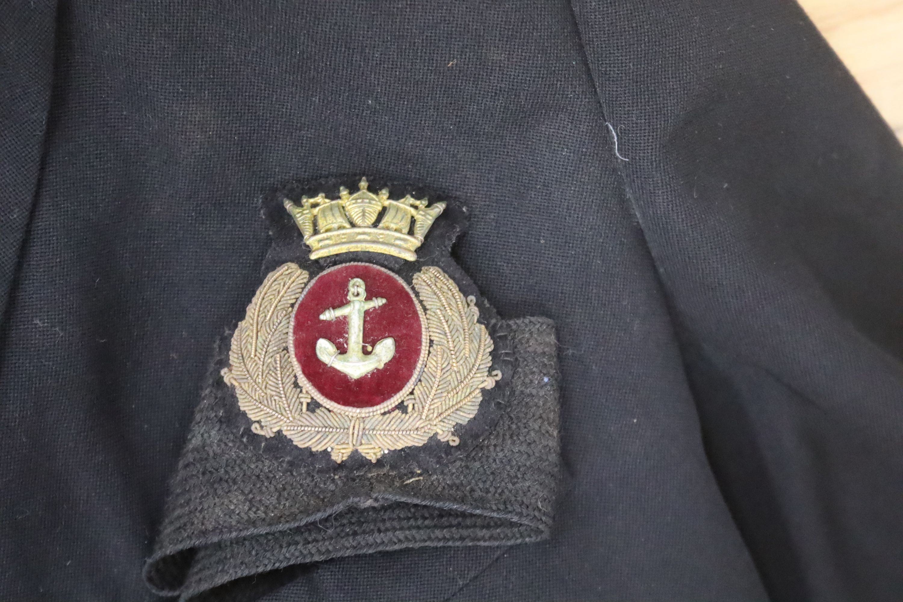 Two Royal Navy Captains jackets and associated trousers